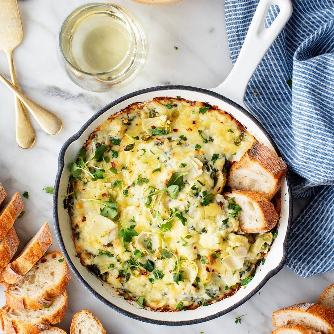 Spinach artichoke dip in a skillet