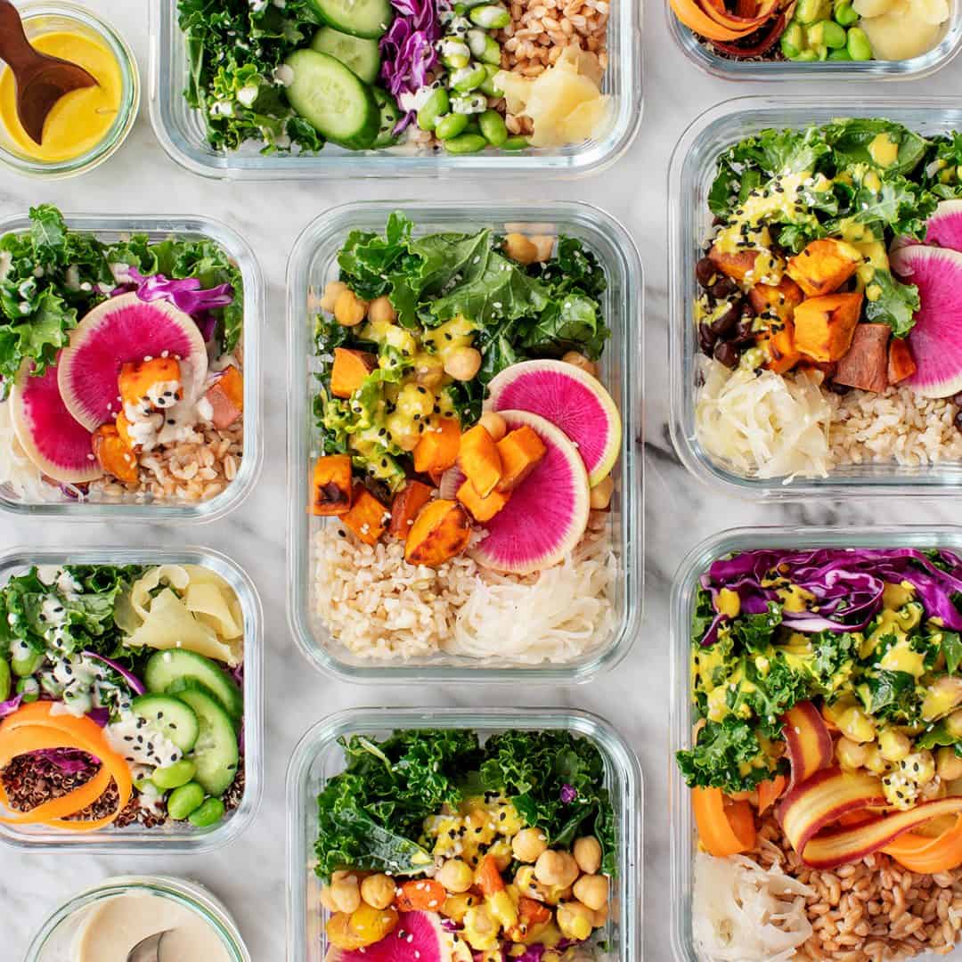 Meal prepped grain bowls in glass containers
