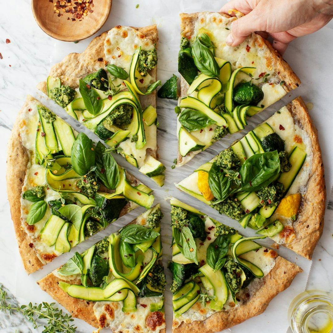 Zucchini pizza with herbs