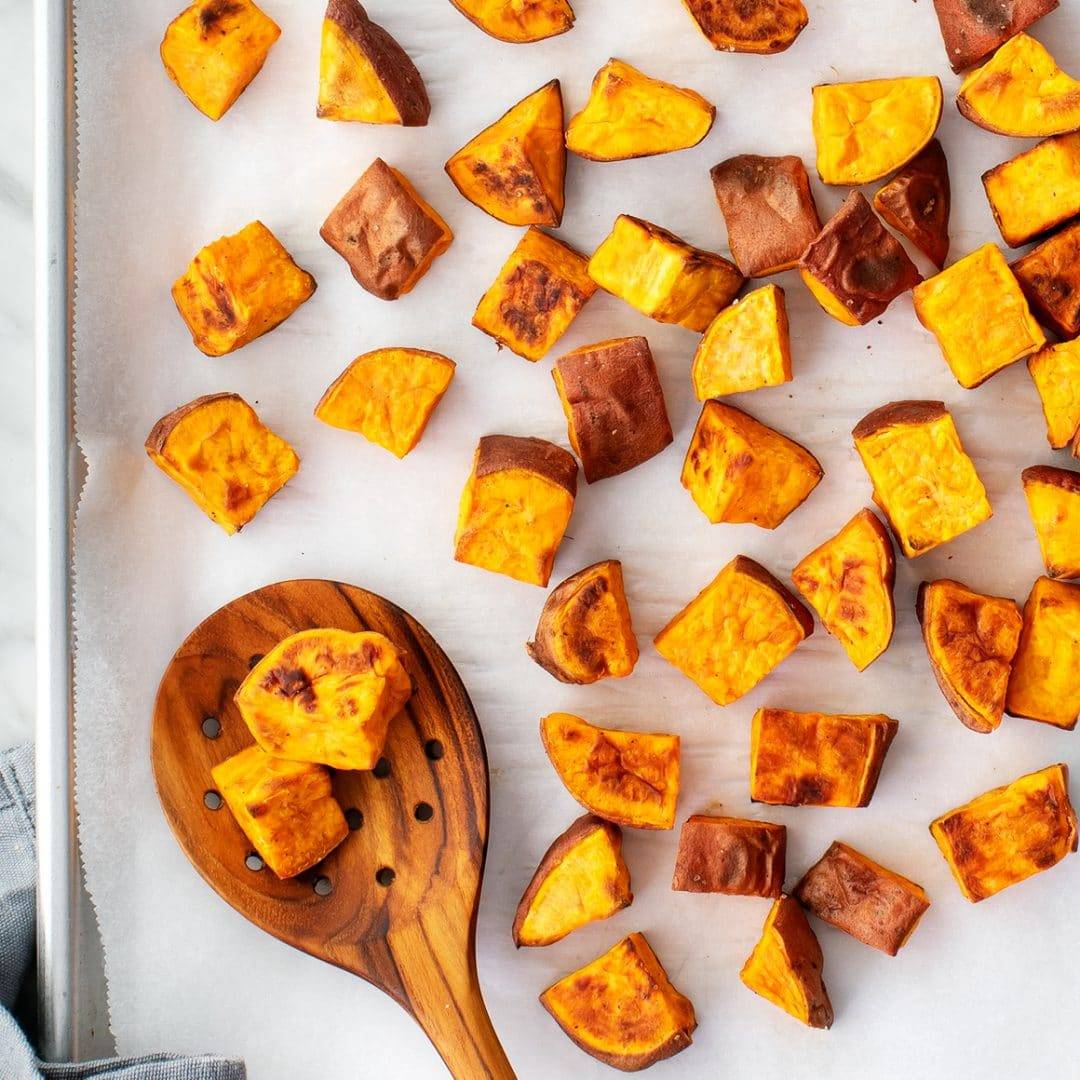 Roasted sweet potatoes on a baking sheet