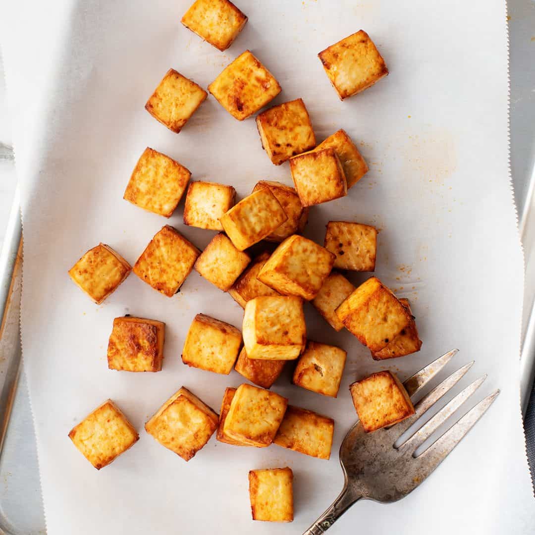 Baked tofu on a baking sheet