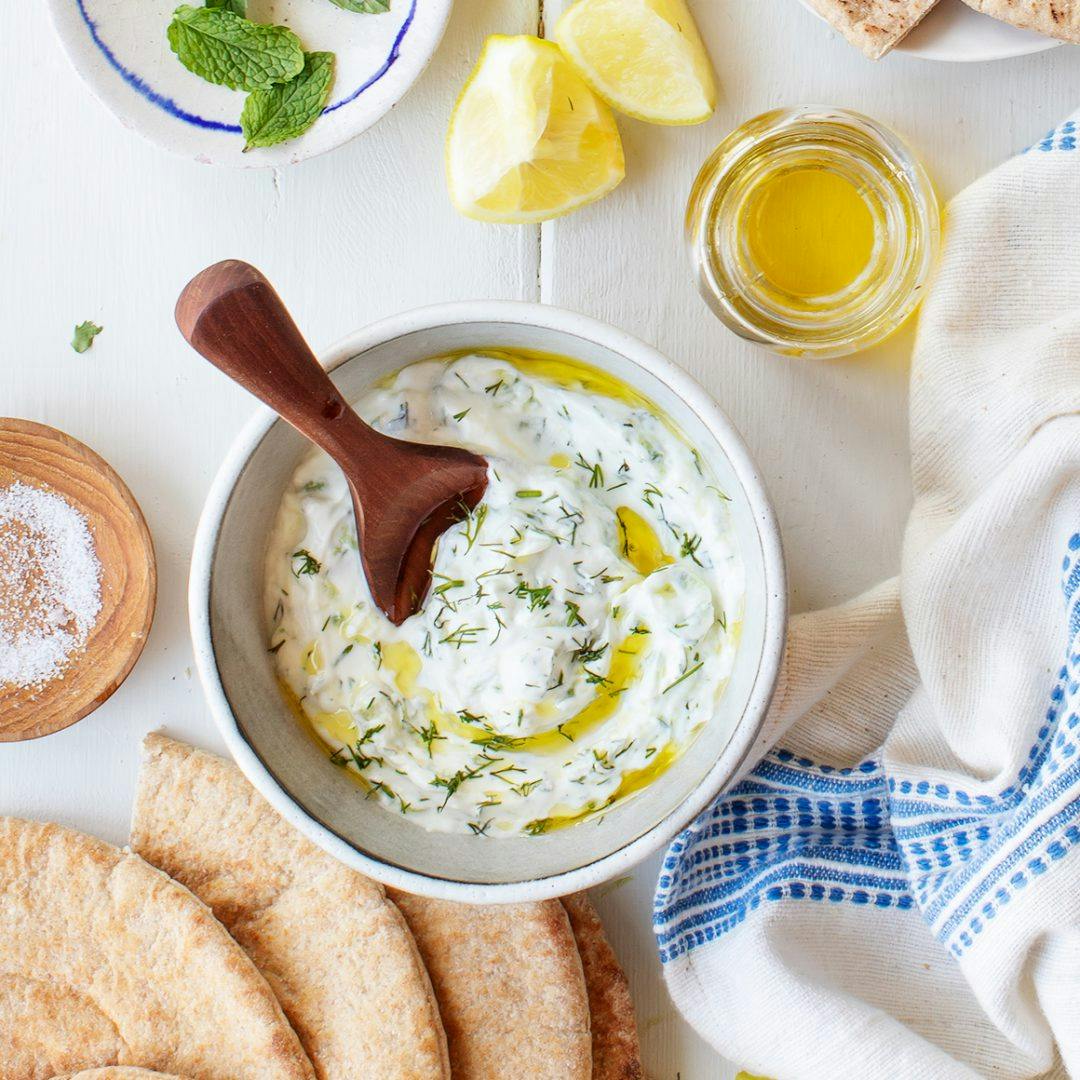 Tzatziki in bowl with spoon