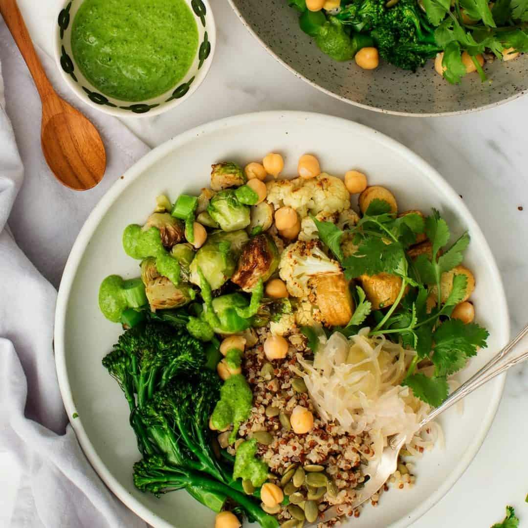 Roasted veggie grain bowl with kale pesto