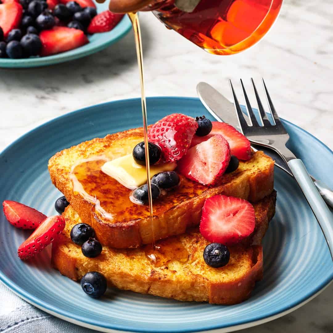 French toast with berries and maple syrup