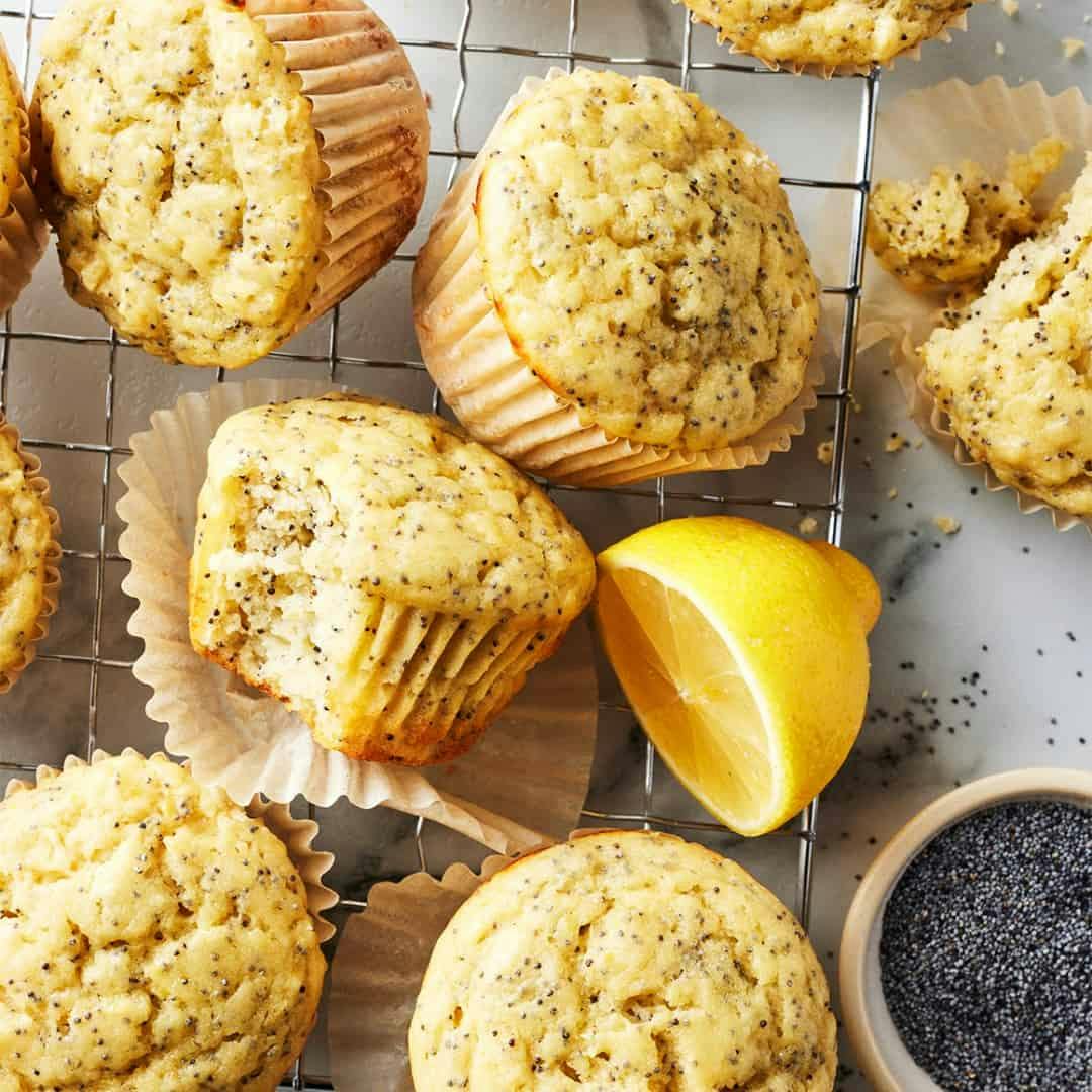 Lemon poppy seed muffins on a cooling rack