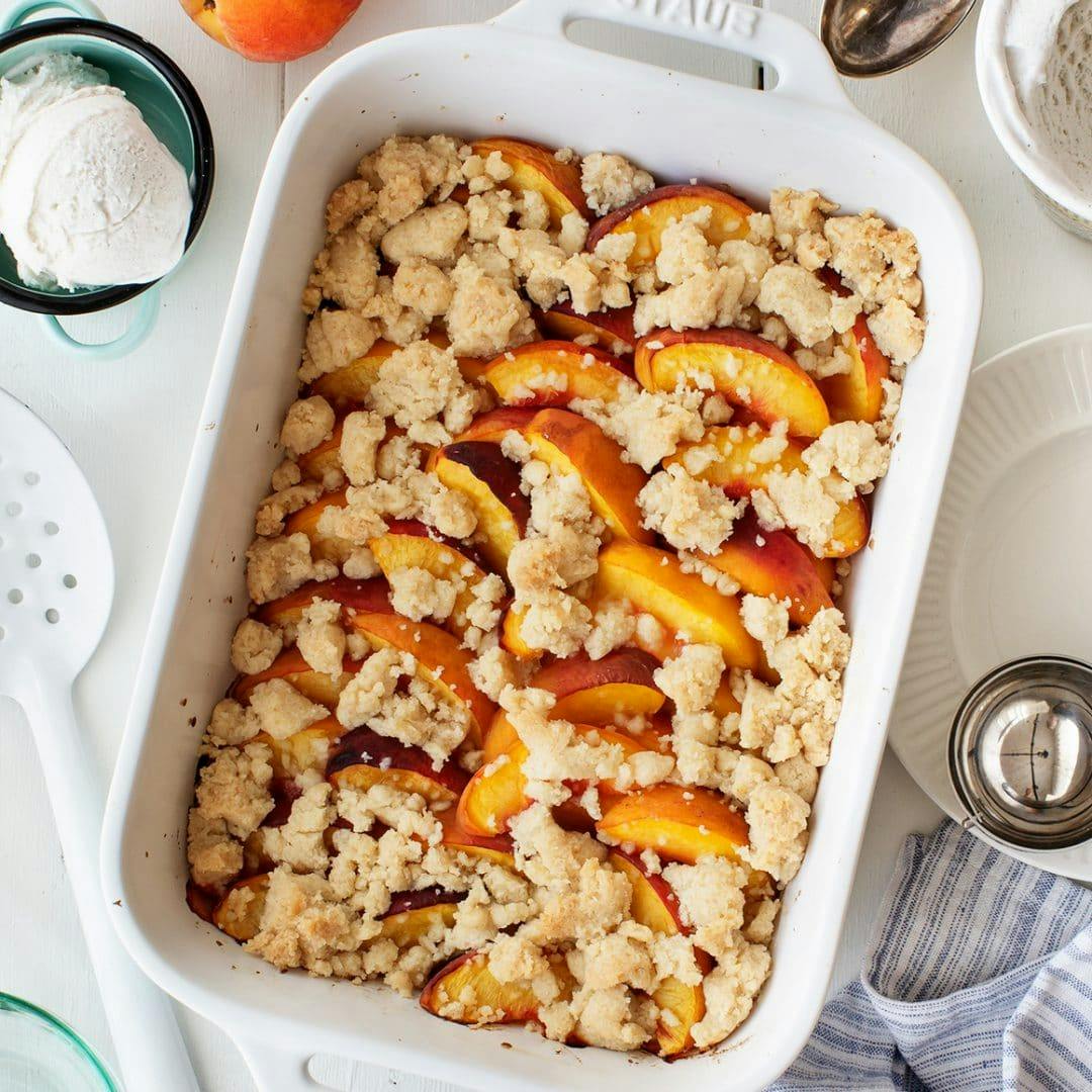 Peach cobbler in a baking dish