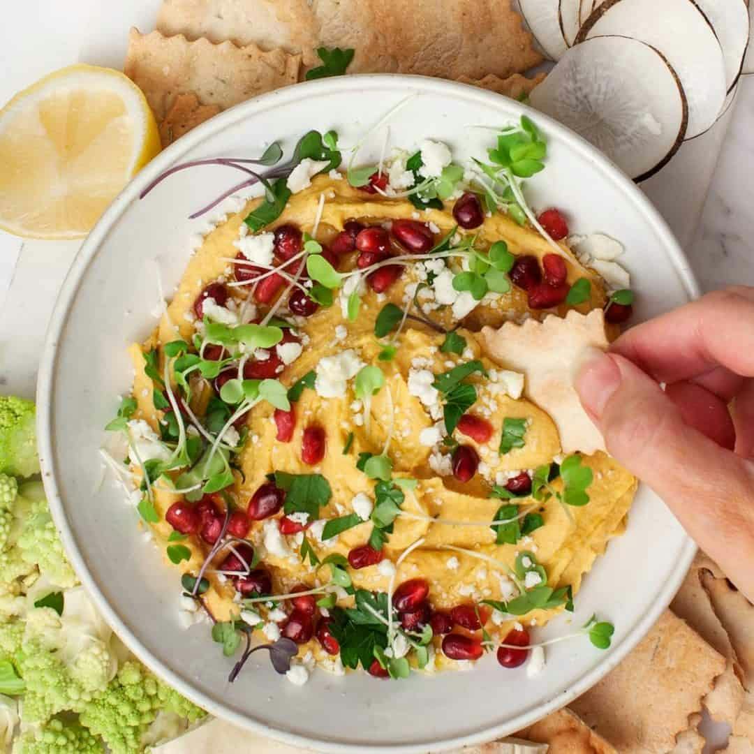 Butternut squash hummus with feta and pomegranates