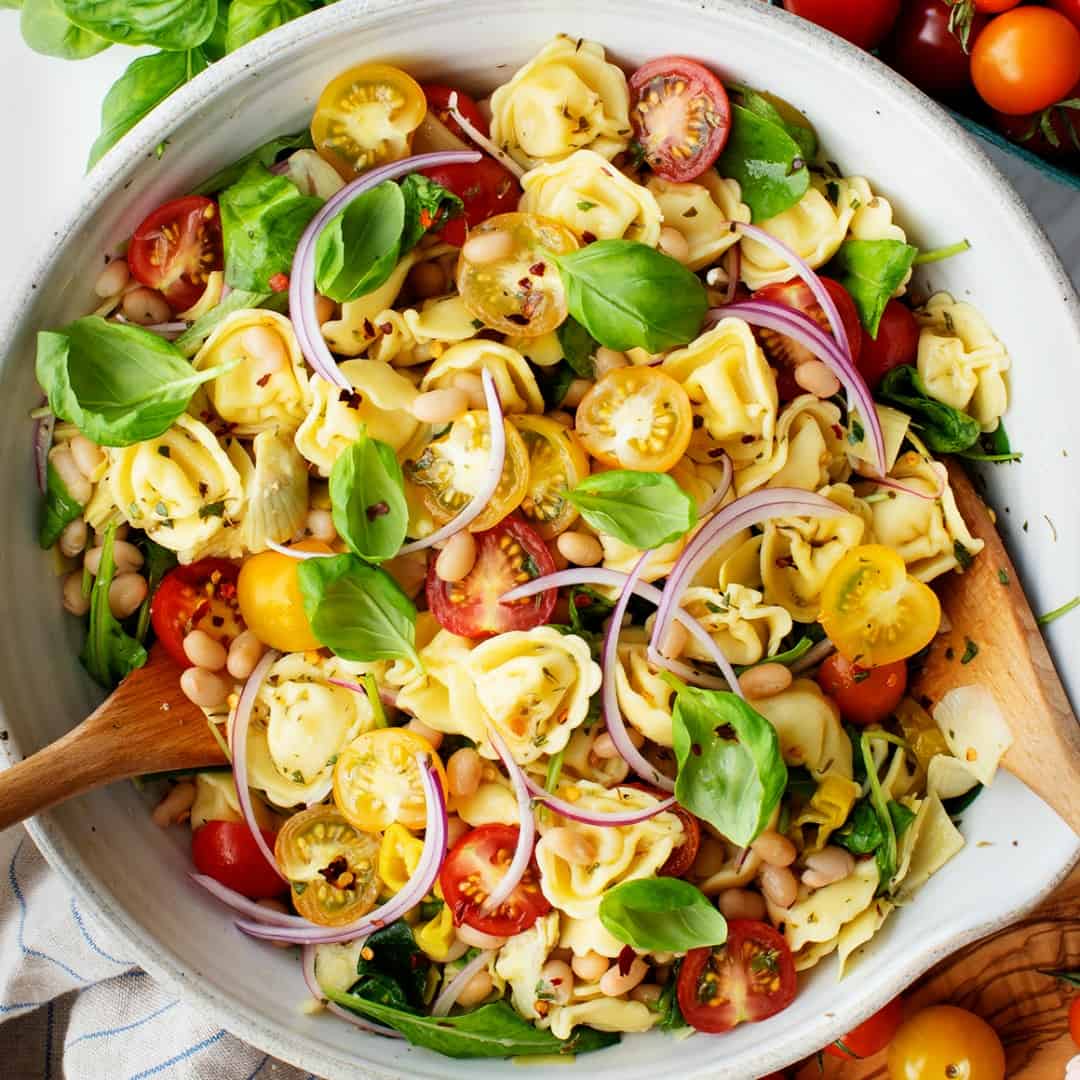 Tortellini salad with cherry tomatoes and basil