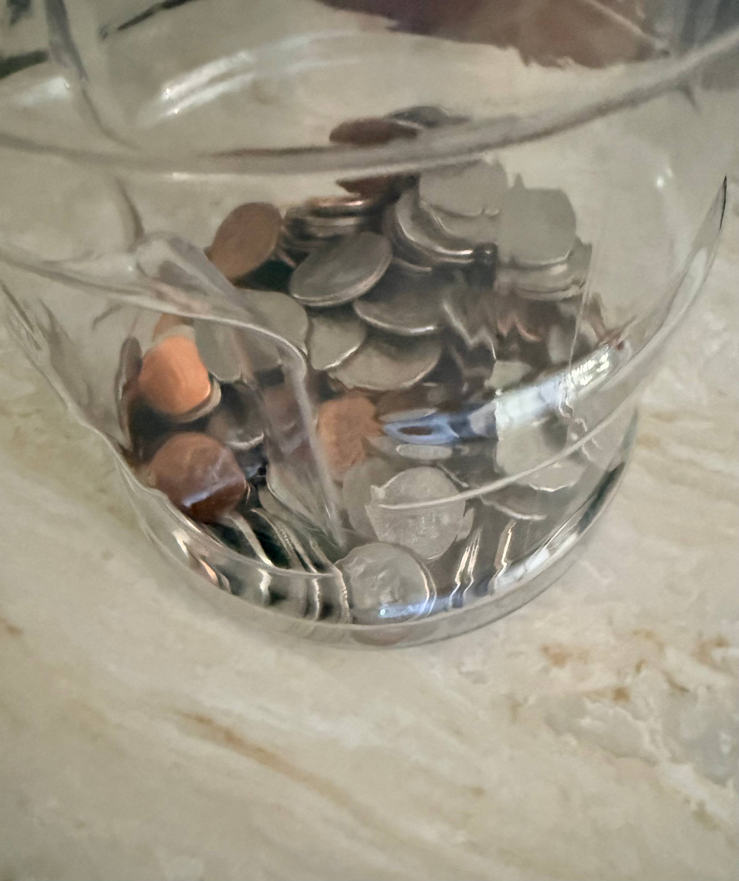 Coins (Change) in a plastic bottle