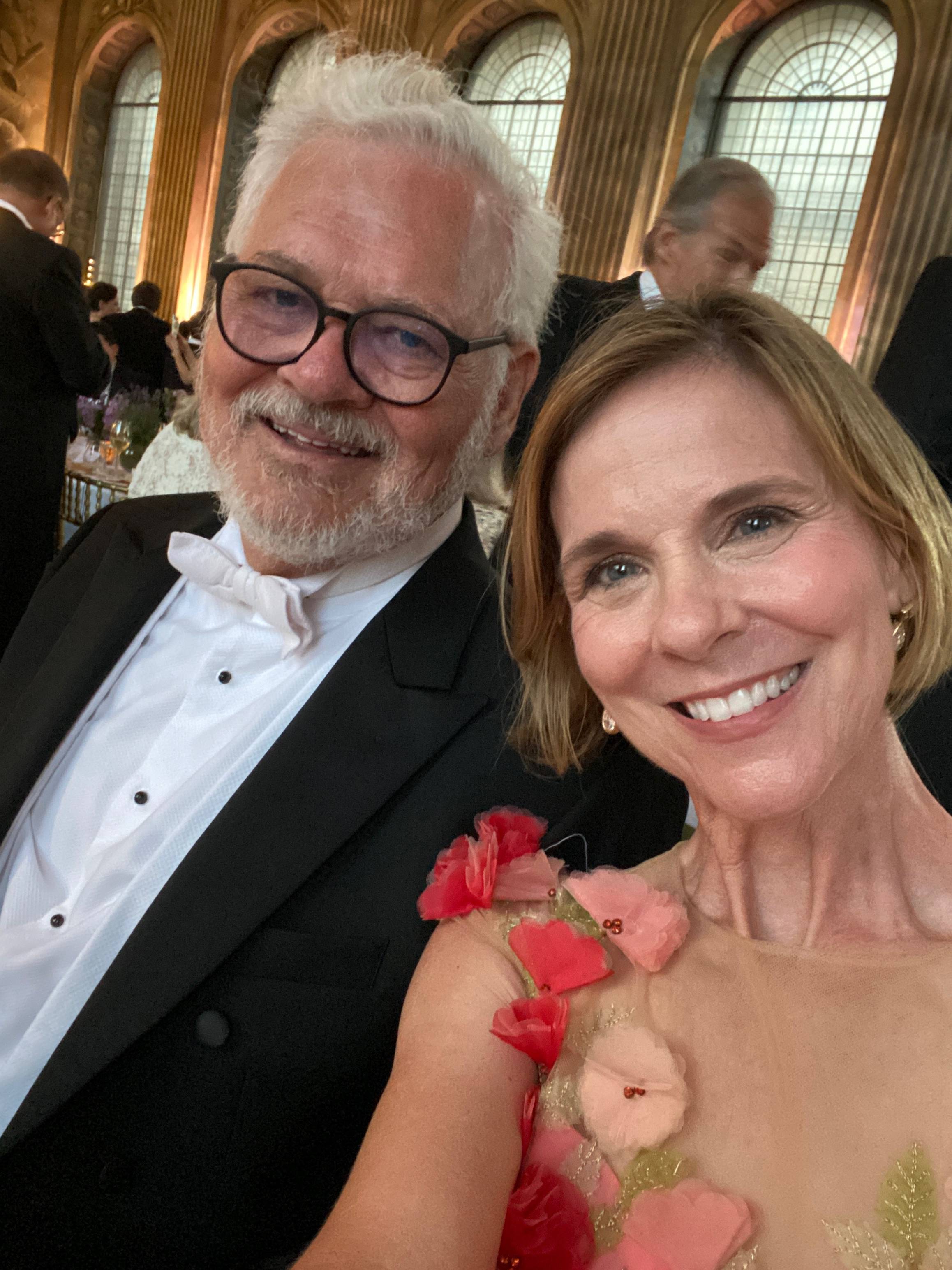Liz Harris and Kevin Harris dressed for white-tie at the Royal Thames Yacht Club's 250th-anniversary dinner inside the Painted Hall in Greenwich.