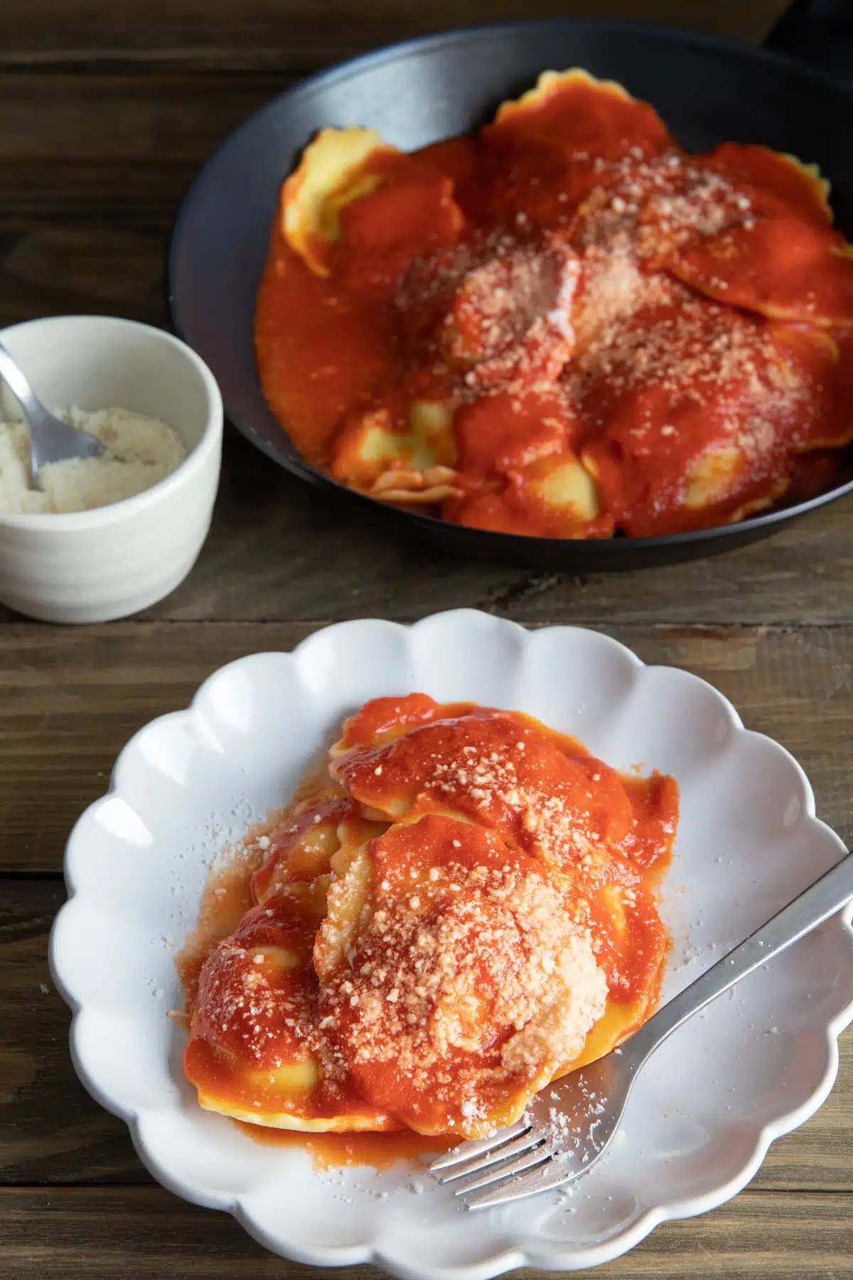 Easy tomato cream sauce with ravioli in a pan and on a plate.