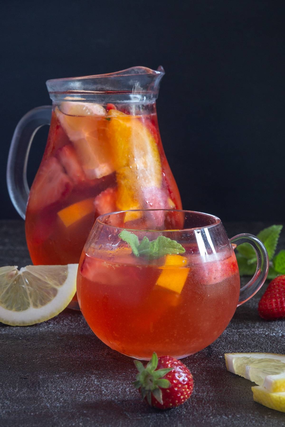 Strawberry sangria in a jug & cup.