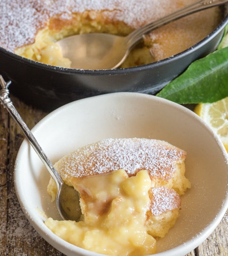 Lemon pudding cake in a dish.