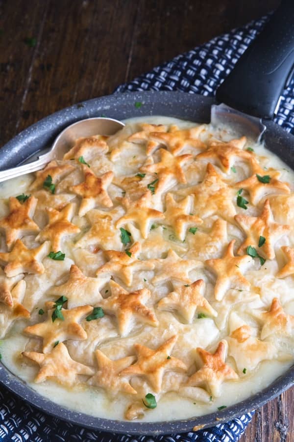 Turkey pot pie in a black pan.