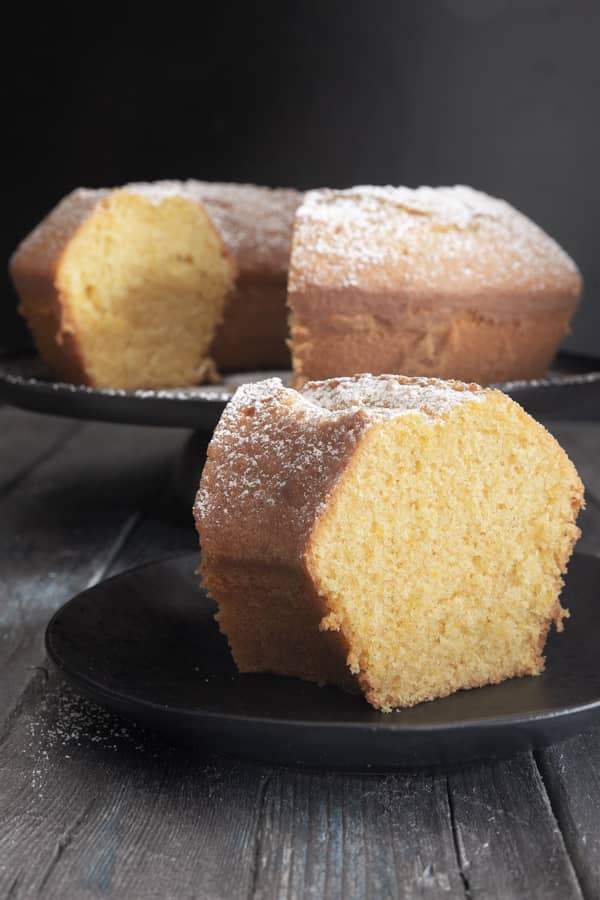 Classic Italian bundt cake with a slice cut.