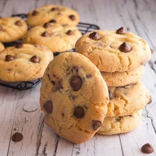 Cookies stacked on a white board.