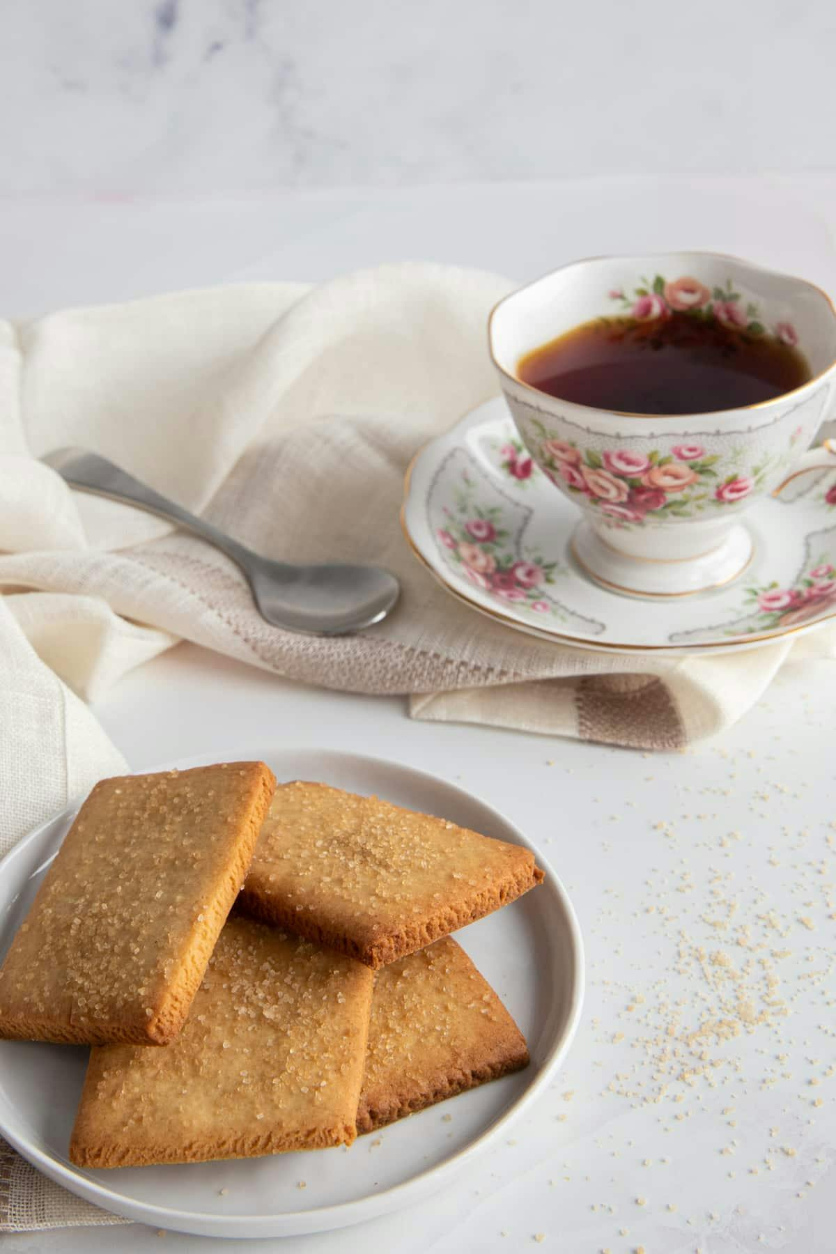 Brown sugar tea biscuits on a white plate.