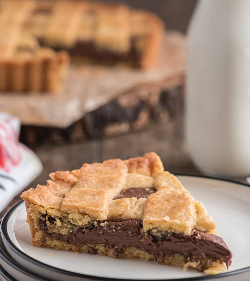 A slice of Nutella Crostata on a plate.