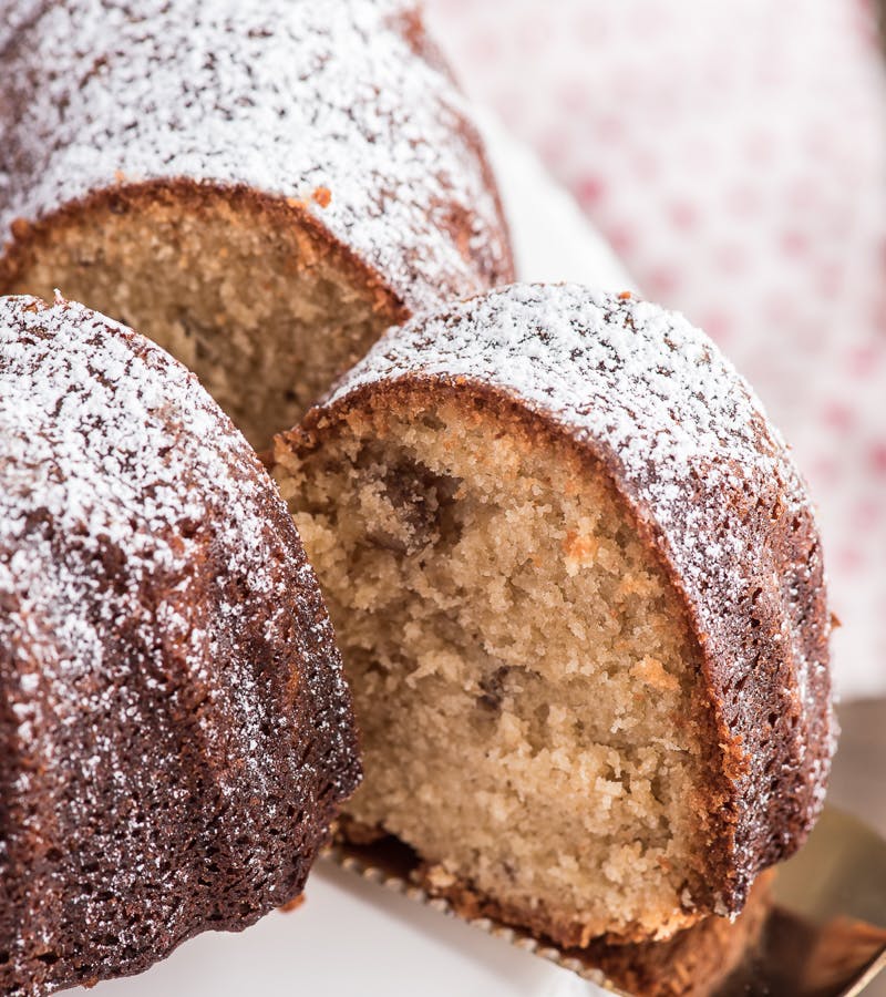 Brown sugar bundt cake with a slice cut.