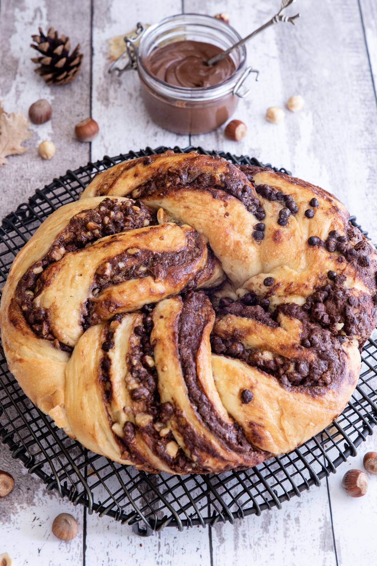 Sourdough chocolate babka on a wire rack.