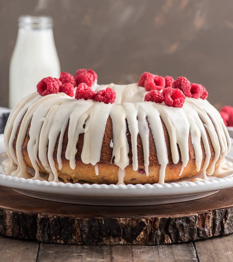 Homemade raspberry bundt cake on a cake stand.