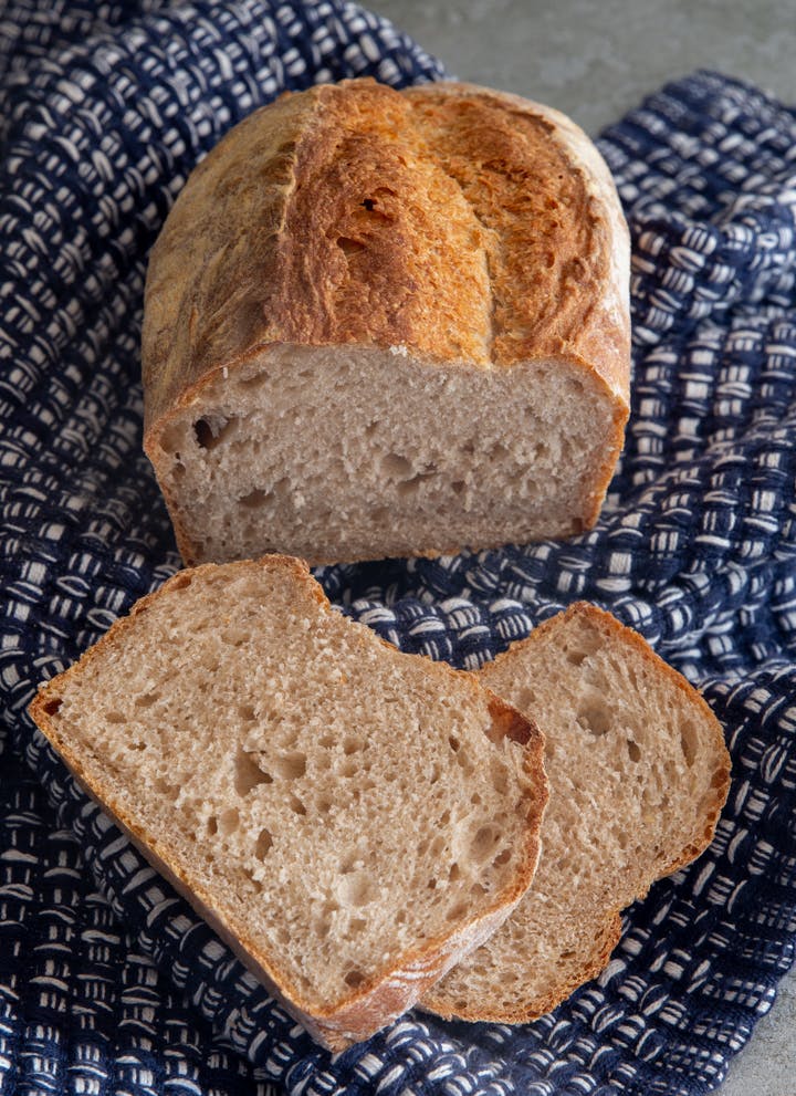 Rye bread with 2 slices cut.