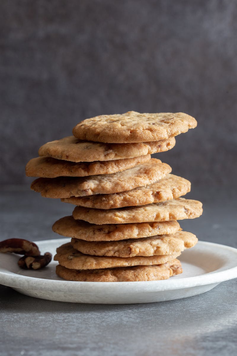 pecan cookies on a white plate.