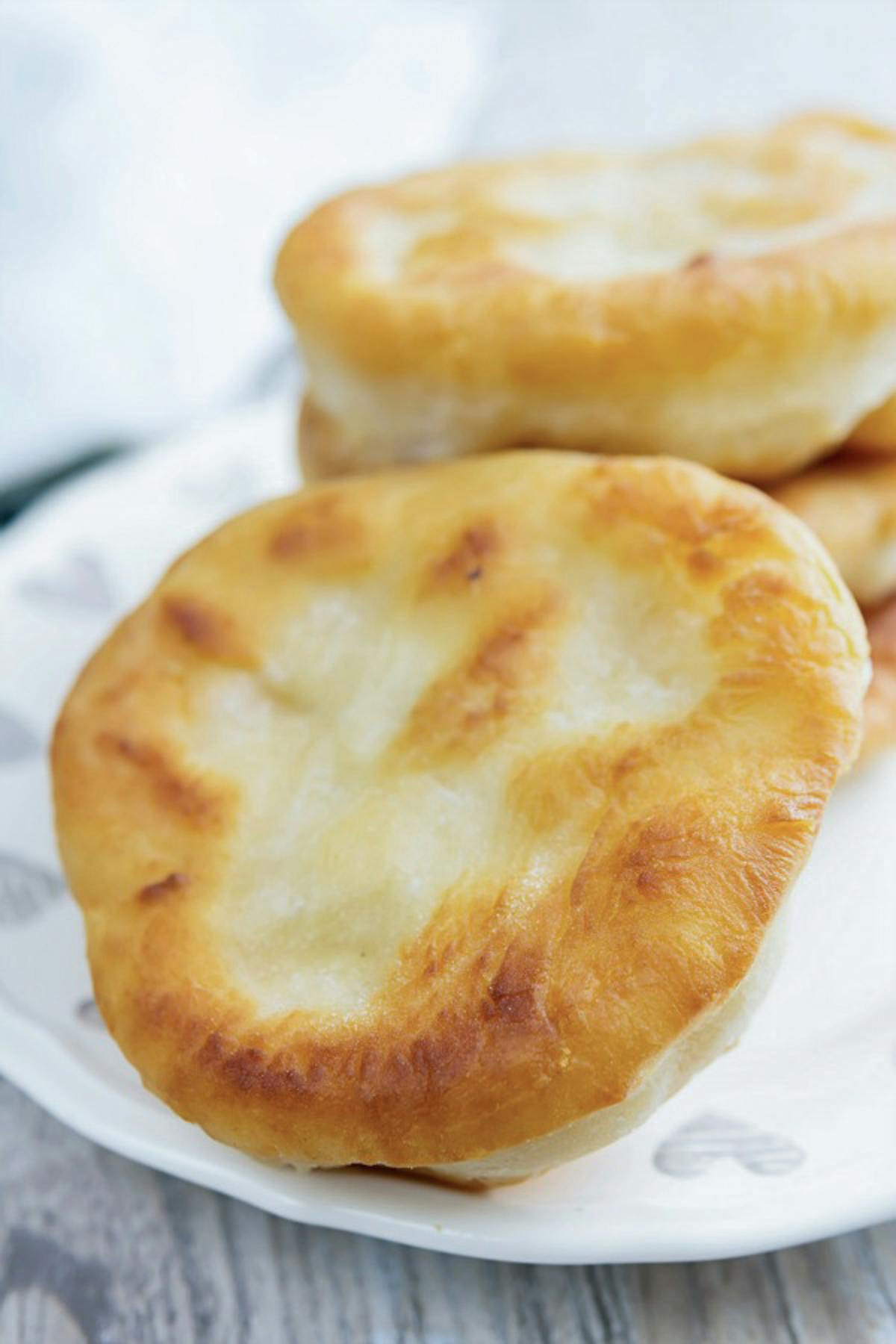 Bannock bread on a white plate.