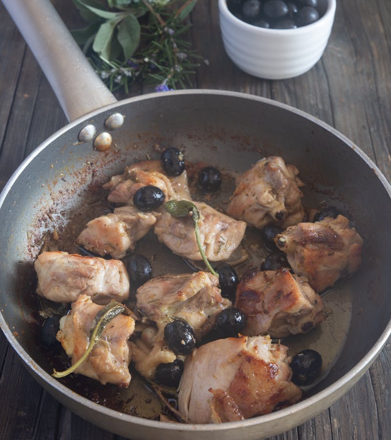 Italian chicken in a pan.