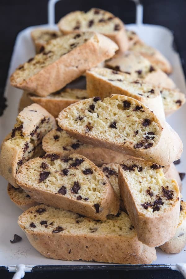 Chocolate chip biscotti on a white tray.