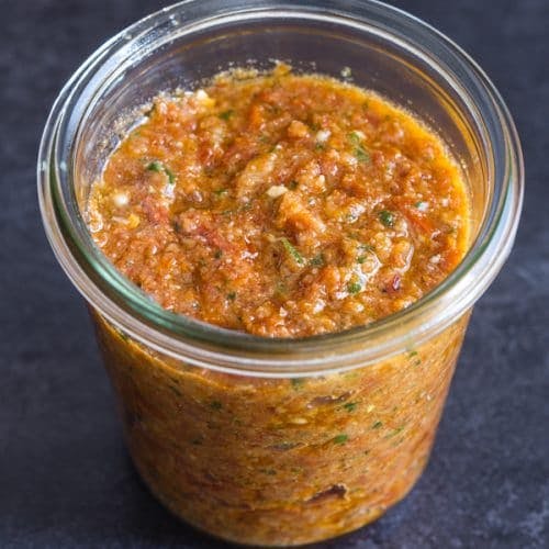 Tomato pesto in a glass jar.