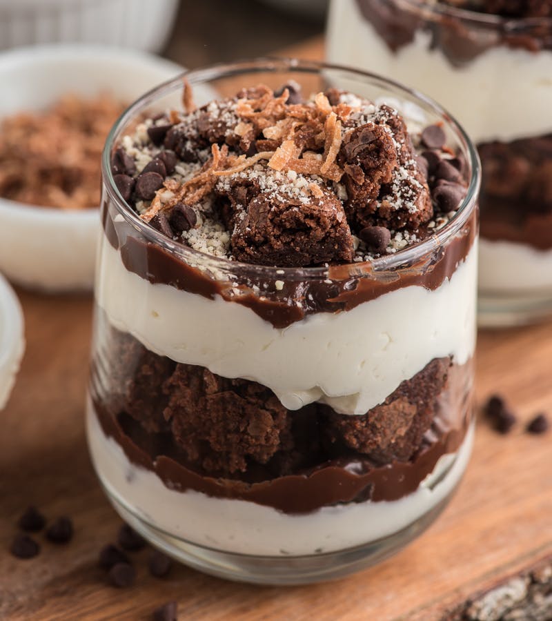 Brownie parfait in a glass jar.