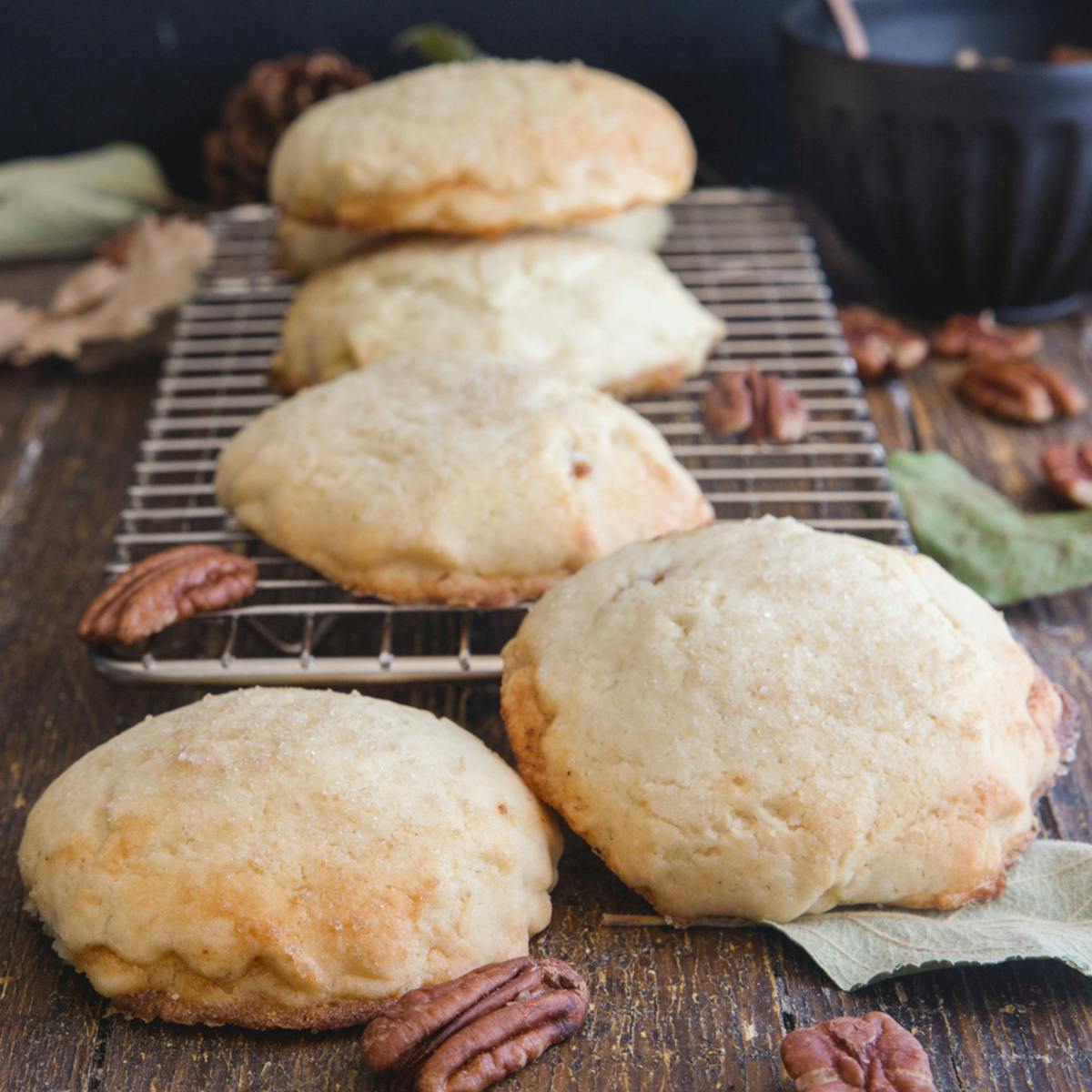 Pecan pie cookies on a wire rack.