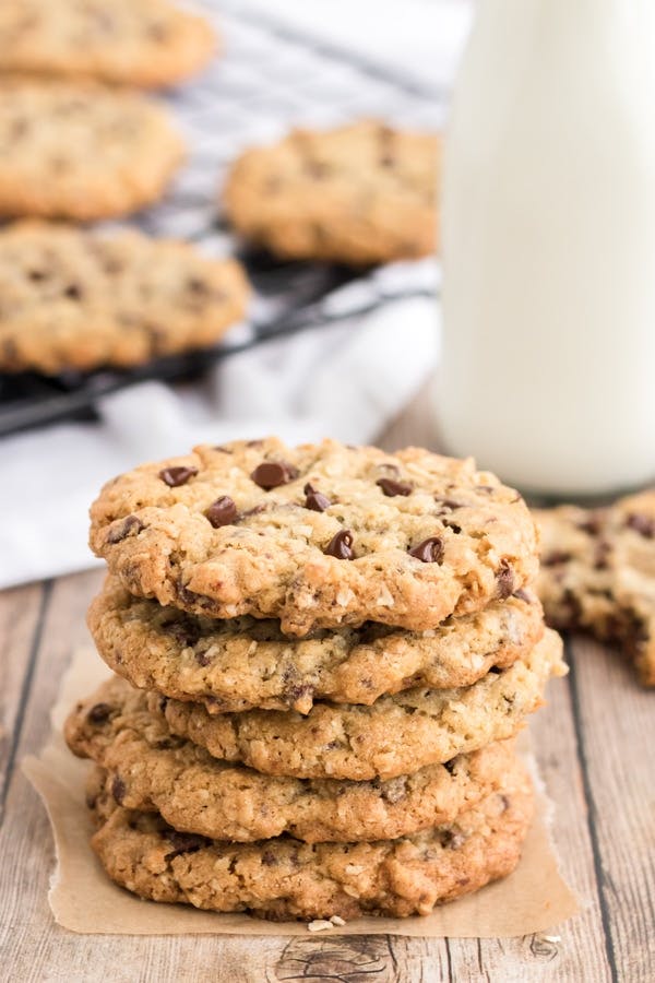 Oatmeal chocolate chip cookies on a wire rack.