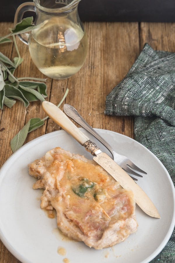 Saltimbocca alla romana on a white plate.