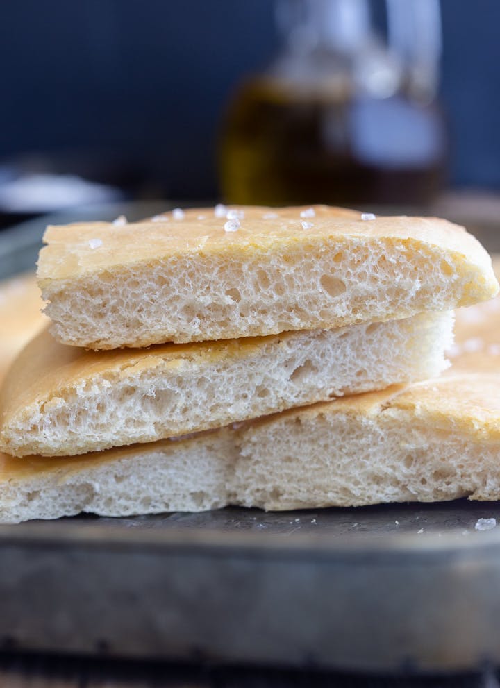 Italian pizza bread 3 slices stacked.