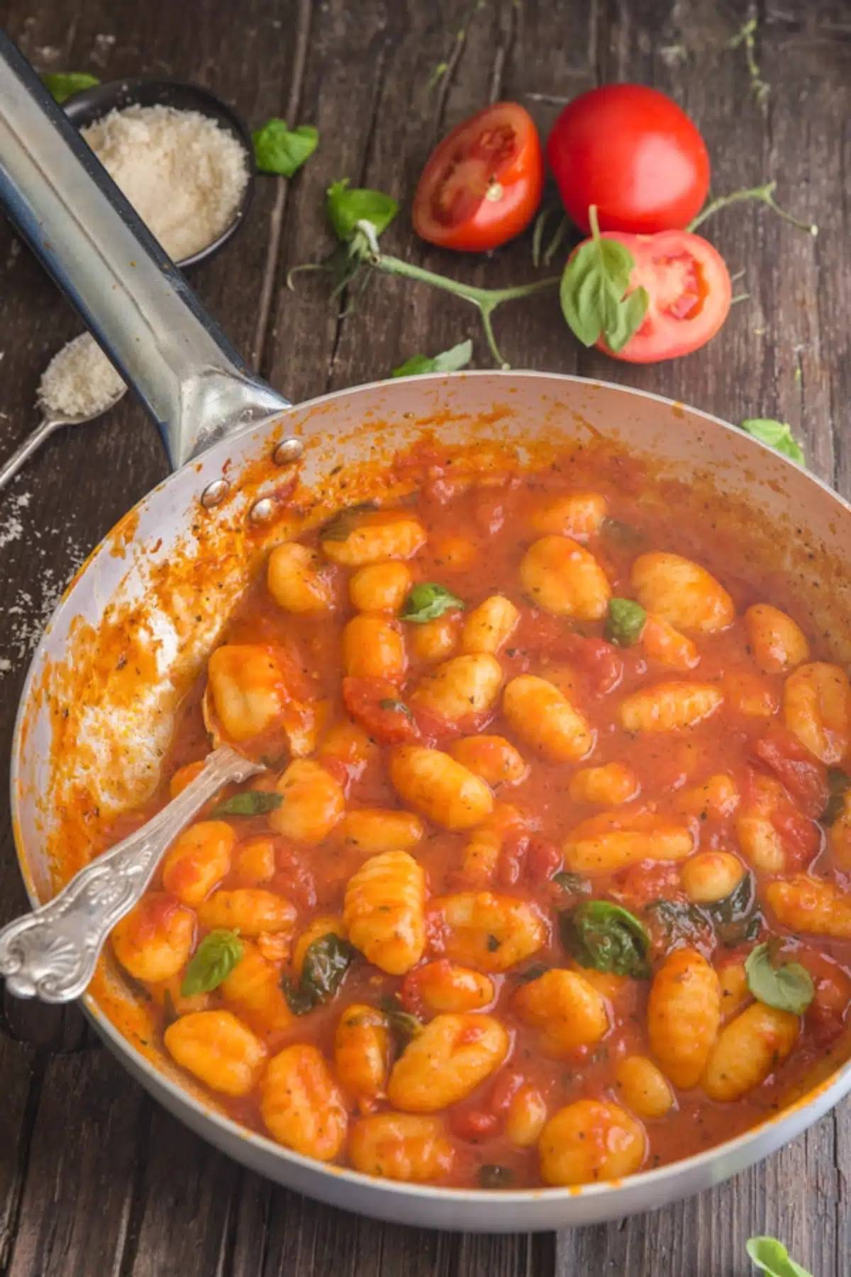 Easy tomato sauce with gnocchi in a silver pan.