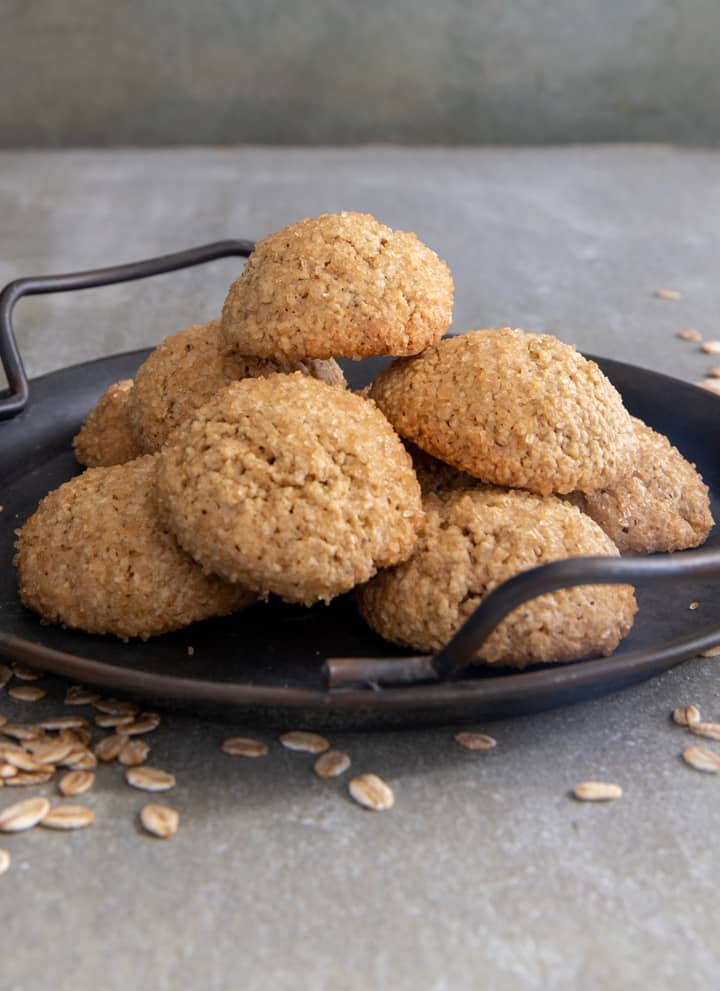 Easy oat flour cookies on a black dish.