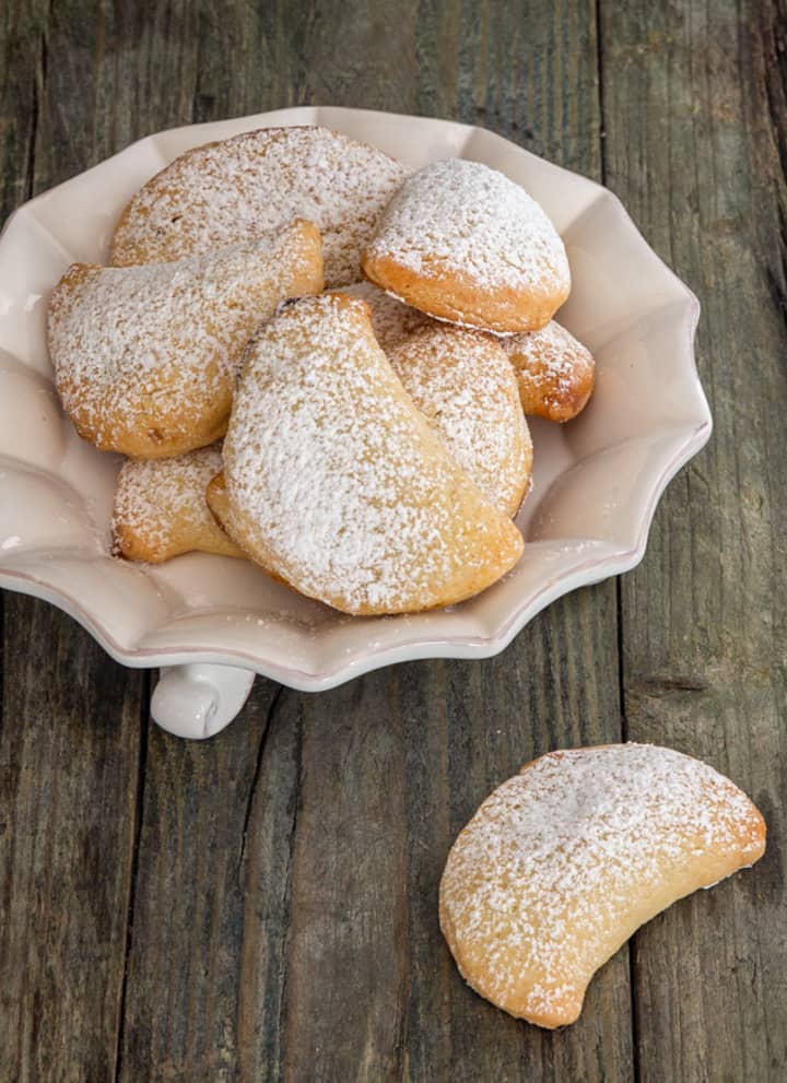 Stuffed cookies on a white plate.