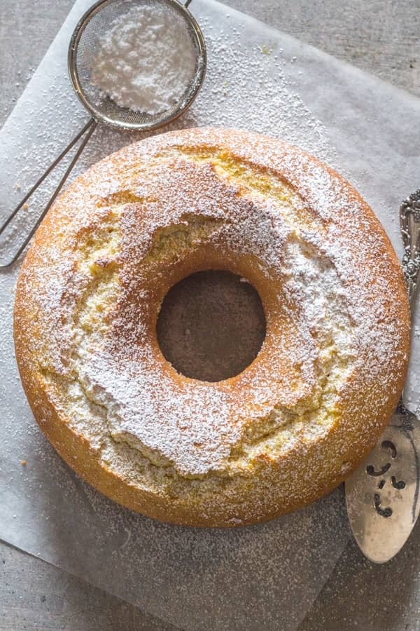 Italian fresh cream lemon cake on parchment paper.