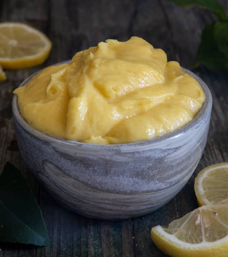 Italian lemon pastry cream in a blue bowl.