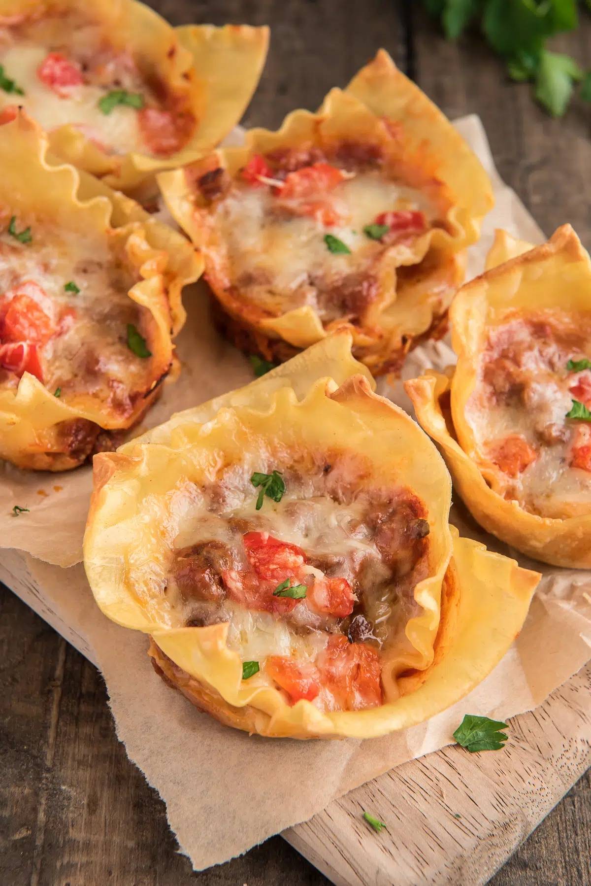 Lasagna cups on brown paper.