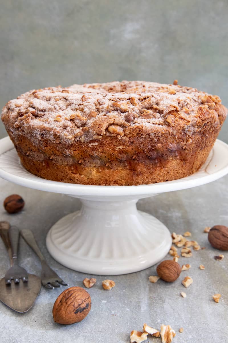 Walnut cake on a cake stand.