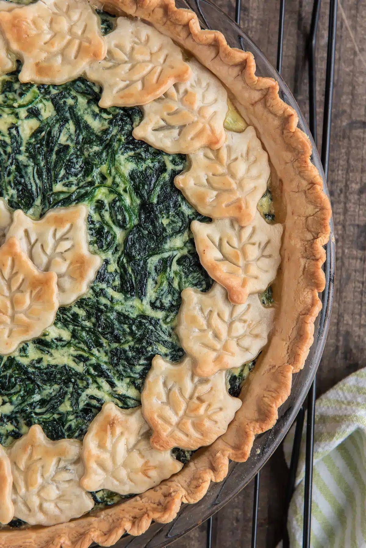 Spinach ricotta pie in a glass dish.