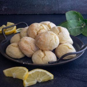 Lemon cookies on a black board.