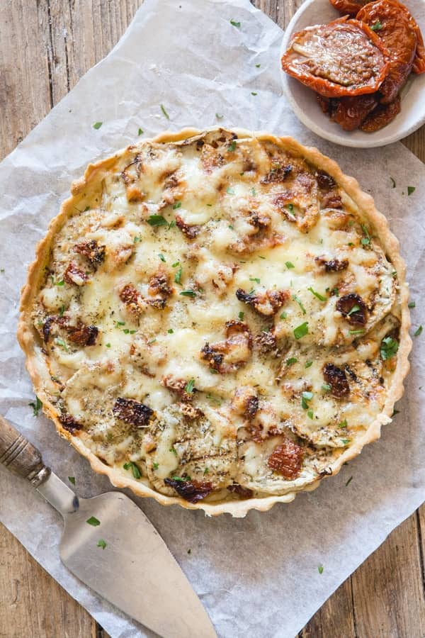 Italian eggplant pie on parchment paper.