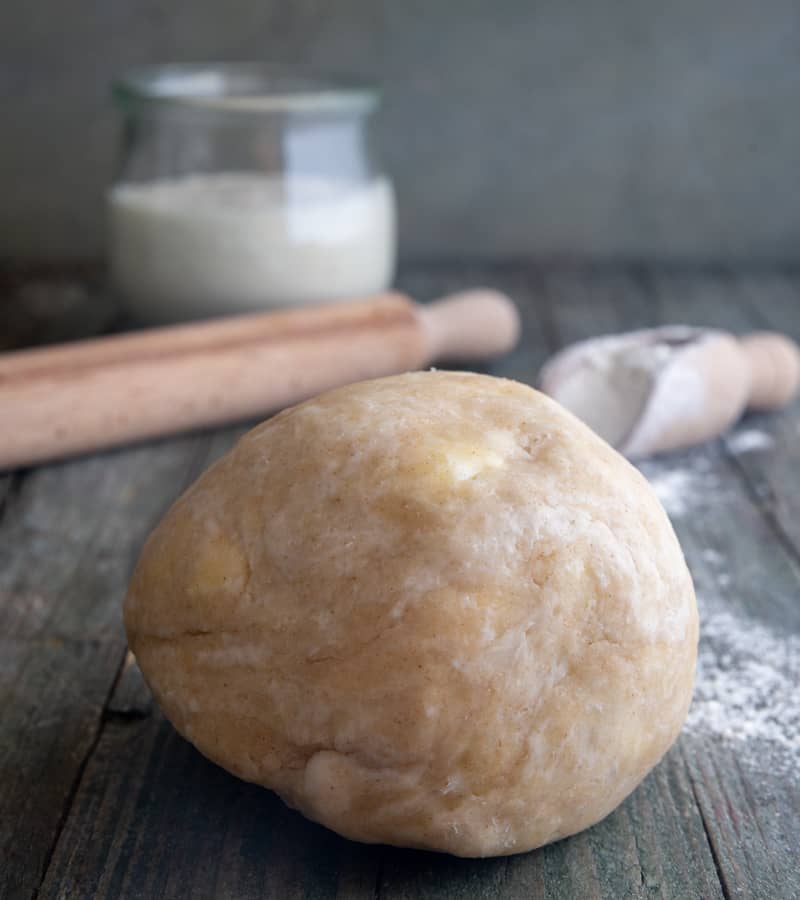 Easy sourdough pie crust on a wooden board.