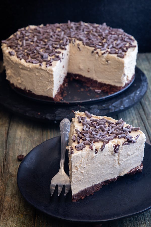 No Bake Coffee cheesecake with a slice cut.