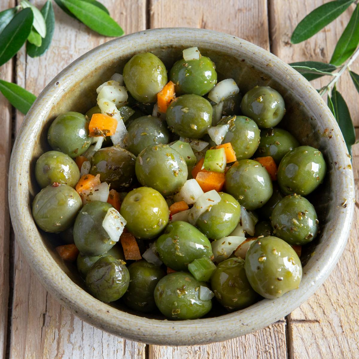 Olive salad in a grey bowl.