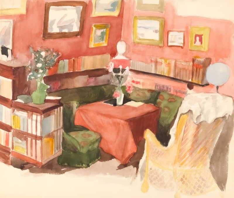 A cozy reading corner is depicted with books.